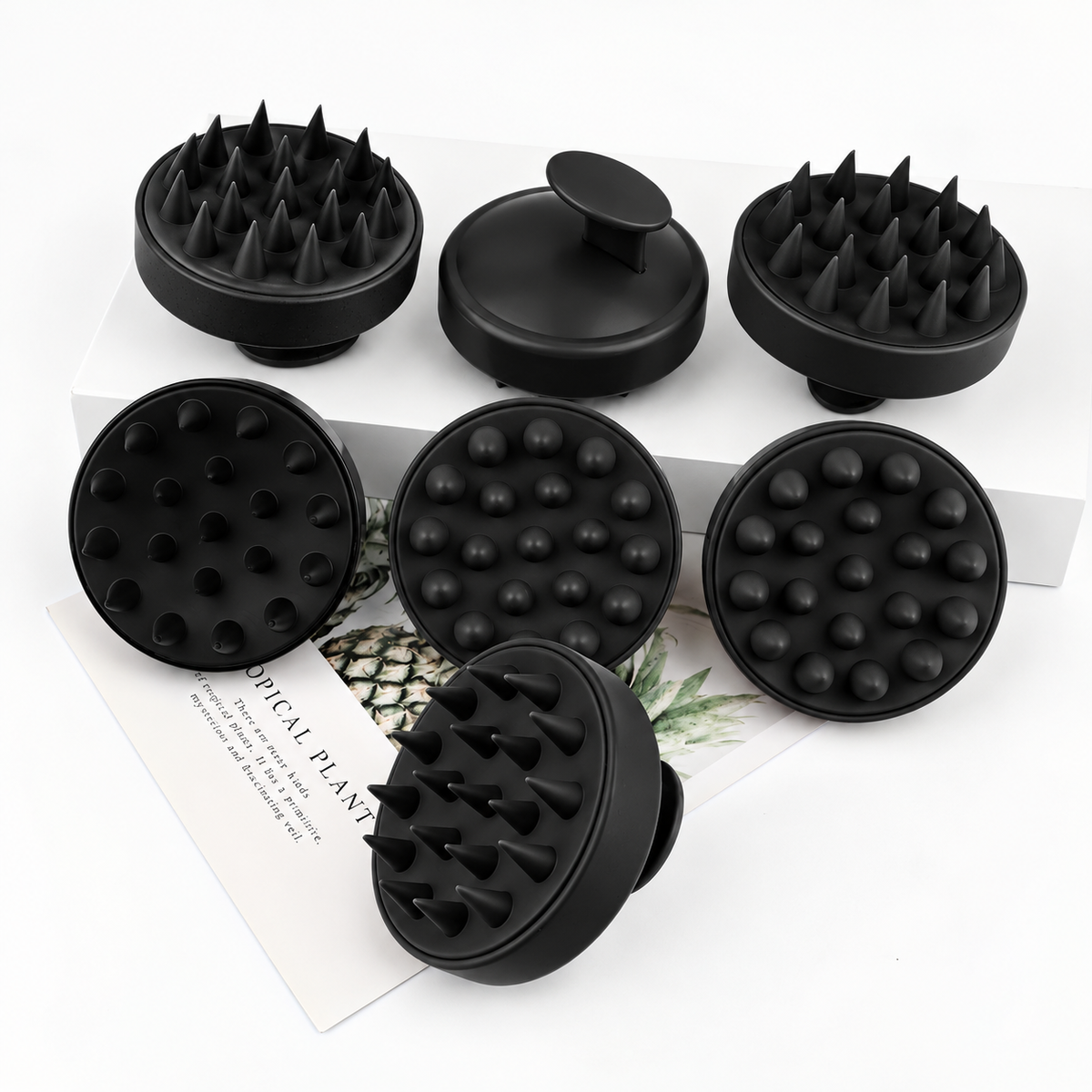 Silicone scalp brushes on display